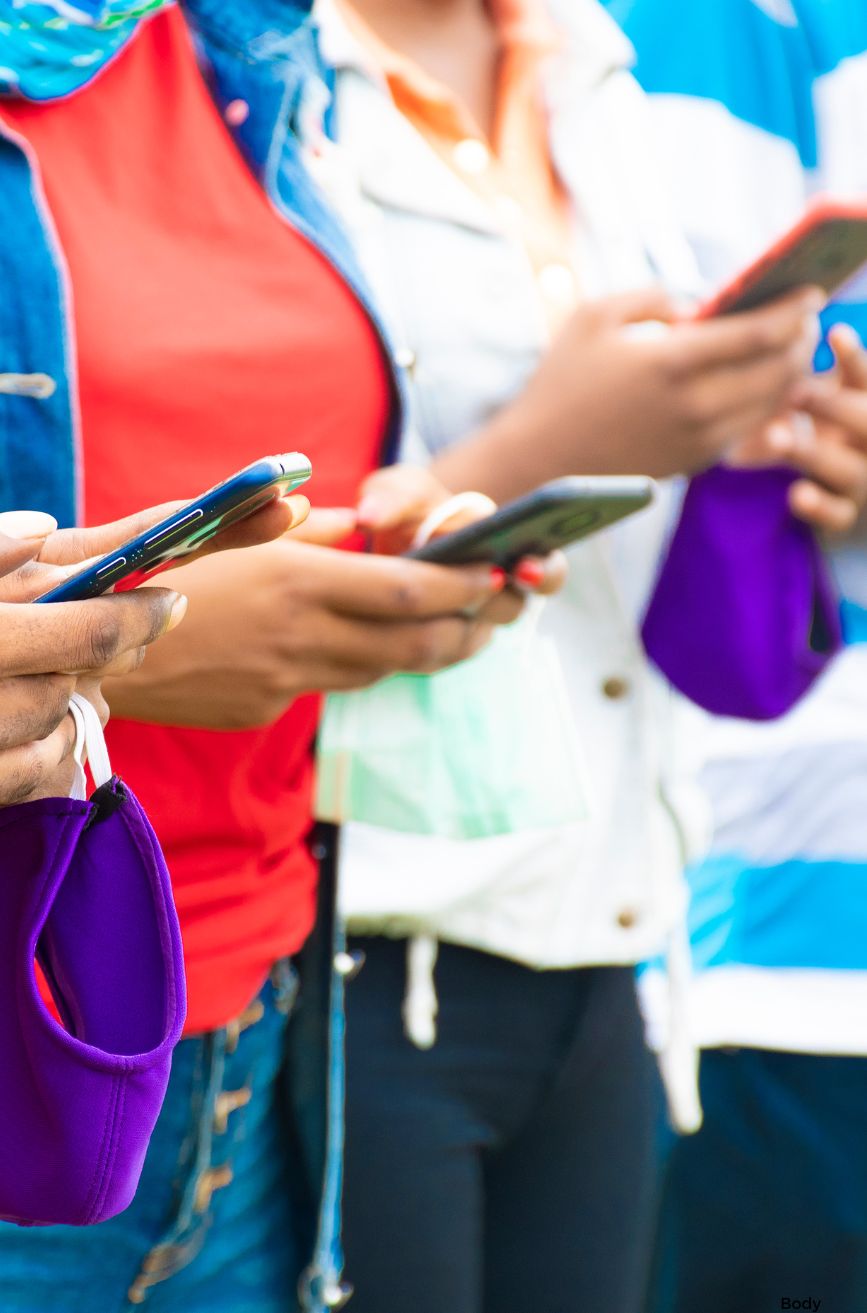 Three Nigerian students browsing STUBUD app for student discount