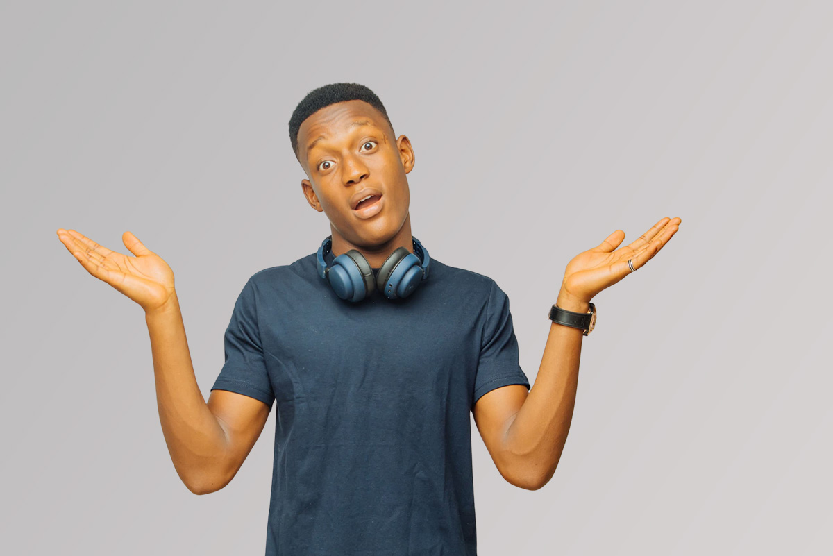 UNIabuja student with headphones making silly excited expression