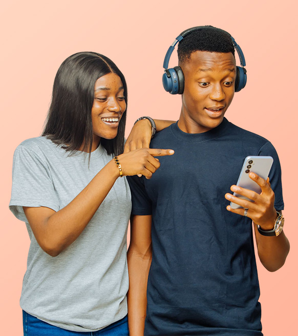 Two students happily discovering STUBUD mobile app