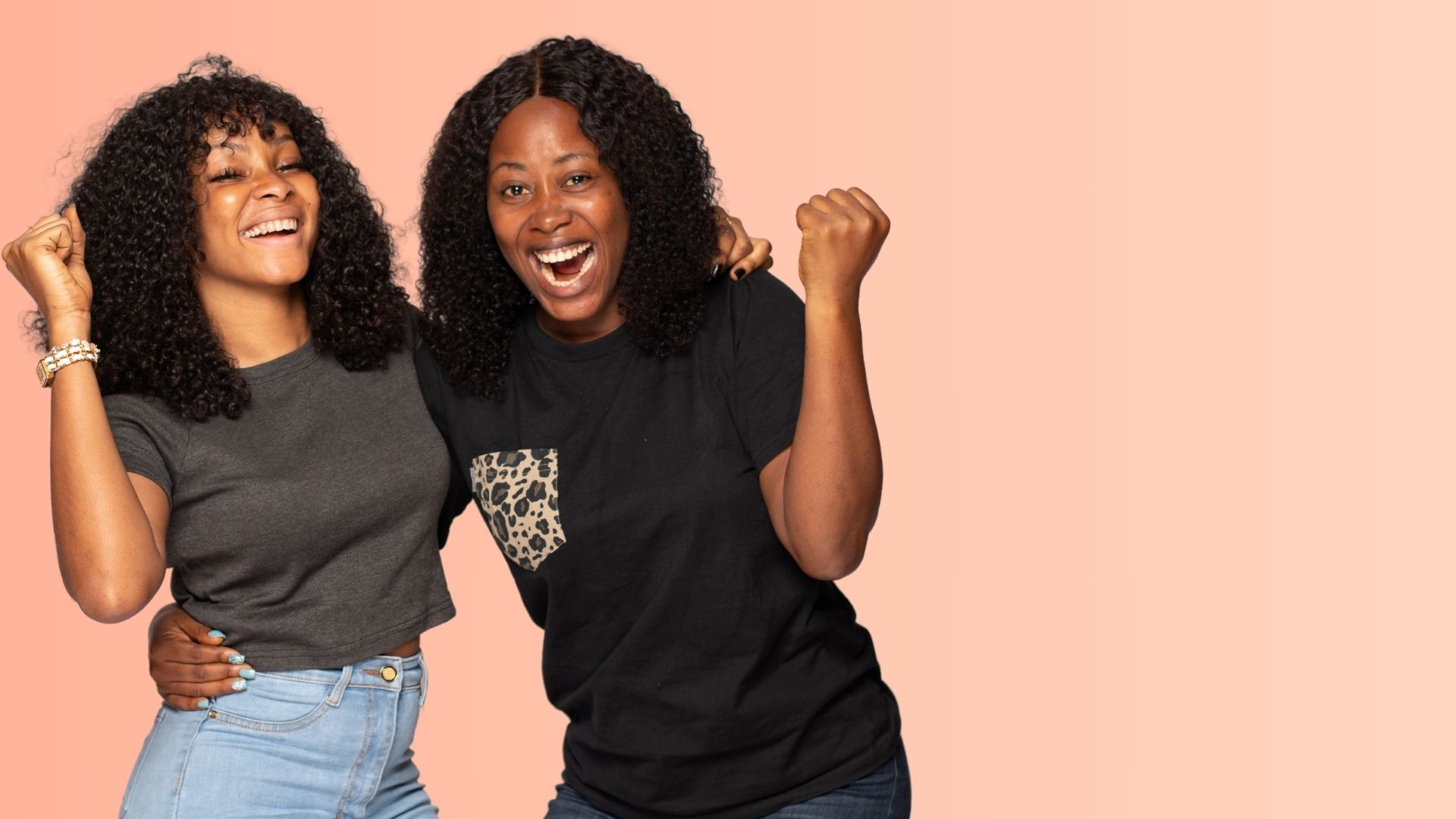 Two students cheering after discovering STUBUD discount offers on campus